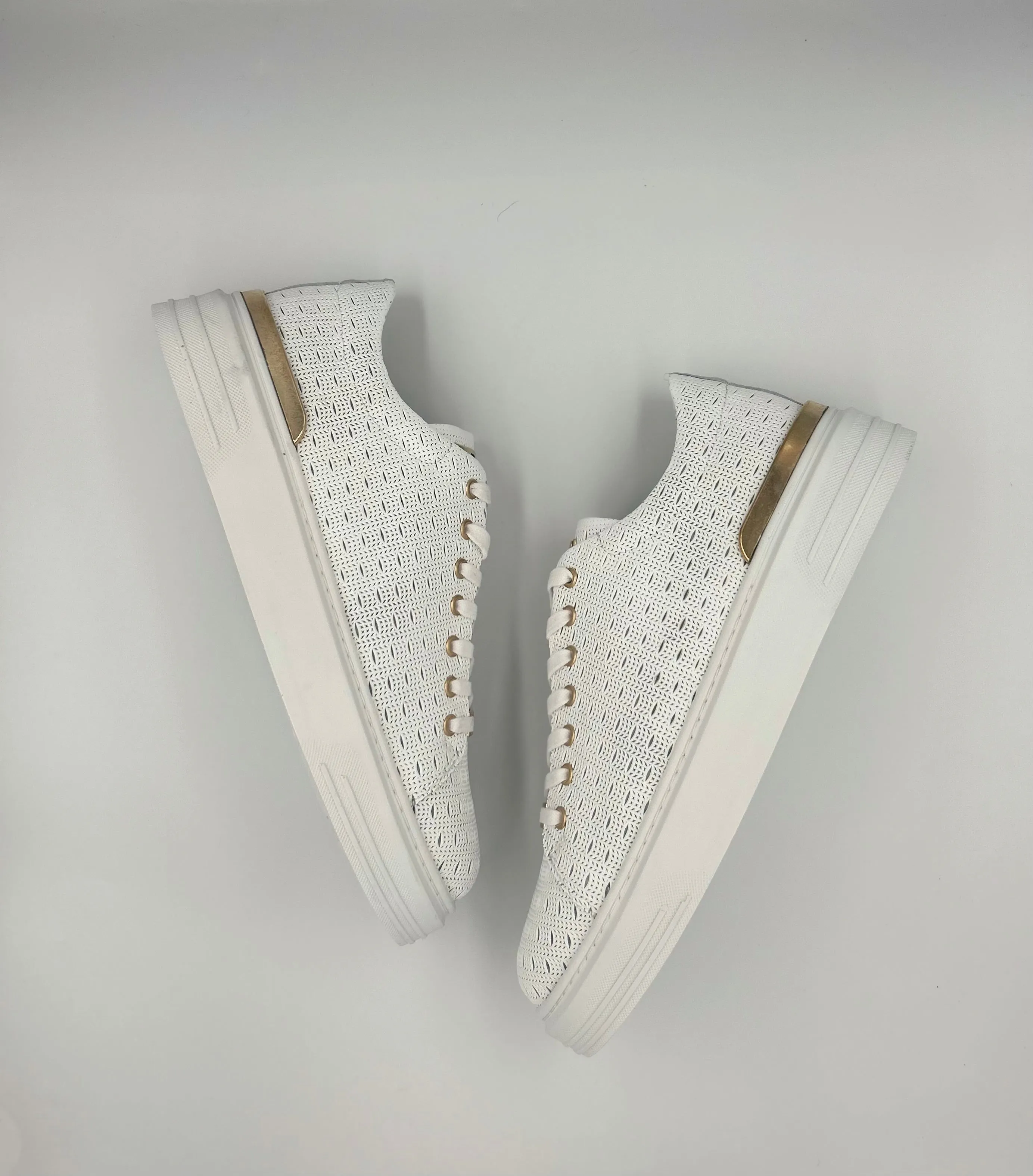 “STADIUM” LOW-TOP SNEAKERS IN PERFORATED WHITE LEATHER